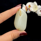 和田玉黄皮籽料挂件（35.2g）