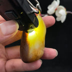 和田玉聚黄皮籽料手把件（61.4g）