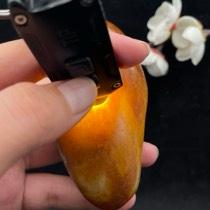和田玉黄沁皮籽料手把件（167.7g）