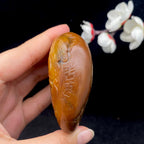 和田玉黄沁皮籽料【黄财神】手把件（176.9g）