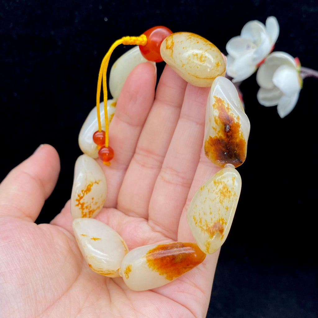 和田玉洒红皮籽料【精品手串】（74.3g）