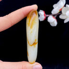 和田玉聚黄皮籽料手把件（85g）