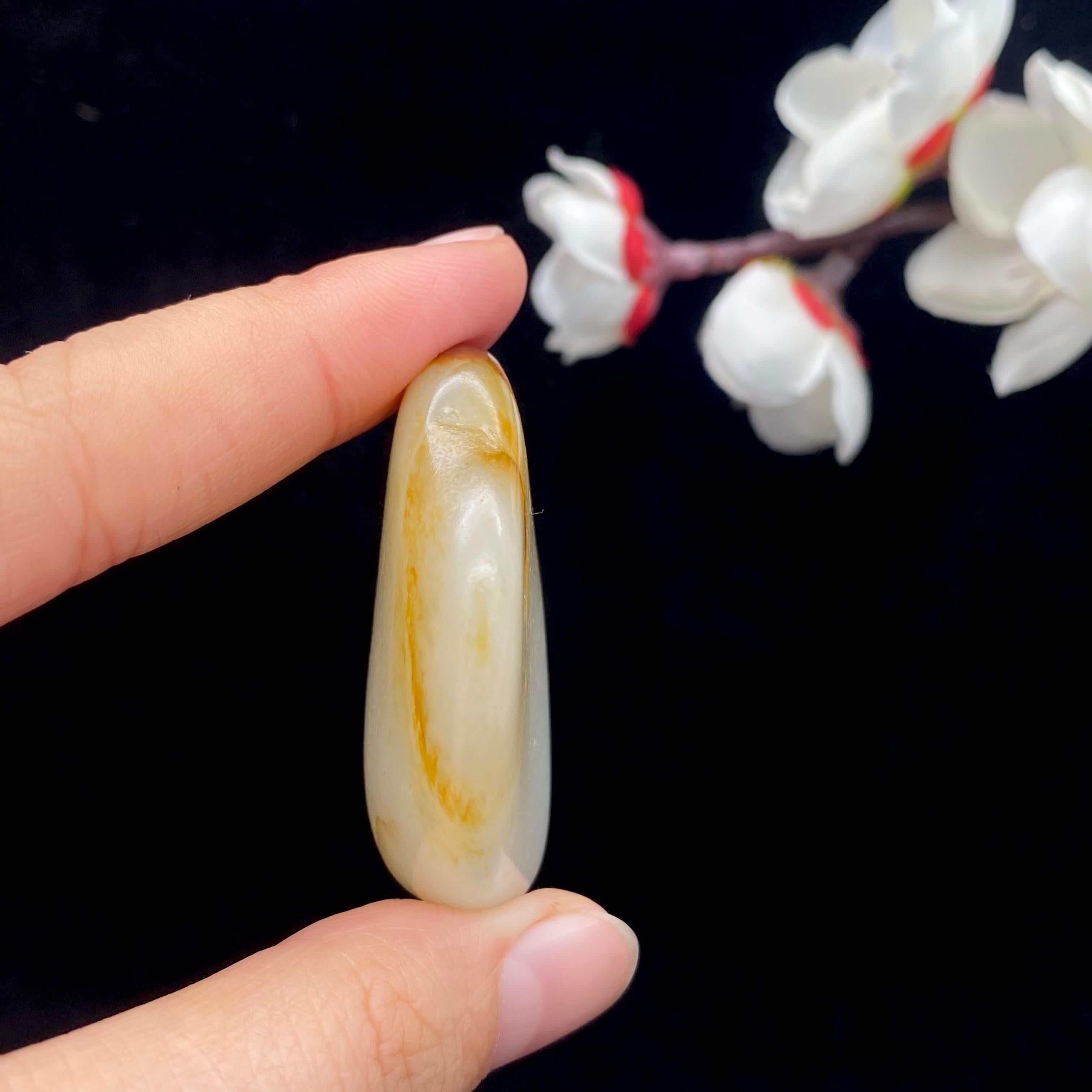 和田玉聚黄皮籽料挂件（27.5g）