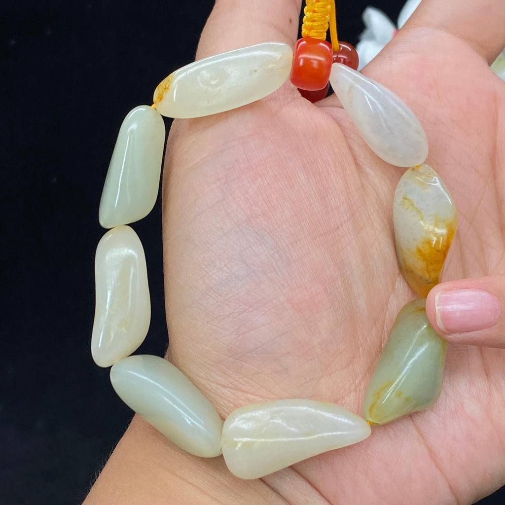 秒杀和田玉黄皮籽料【精品手串】（47.3g）