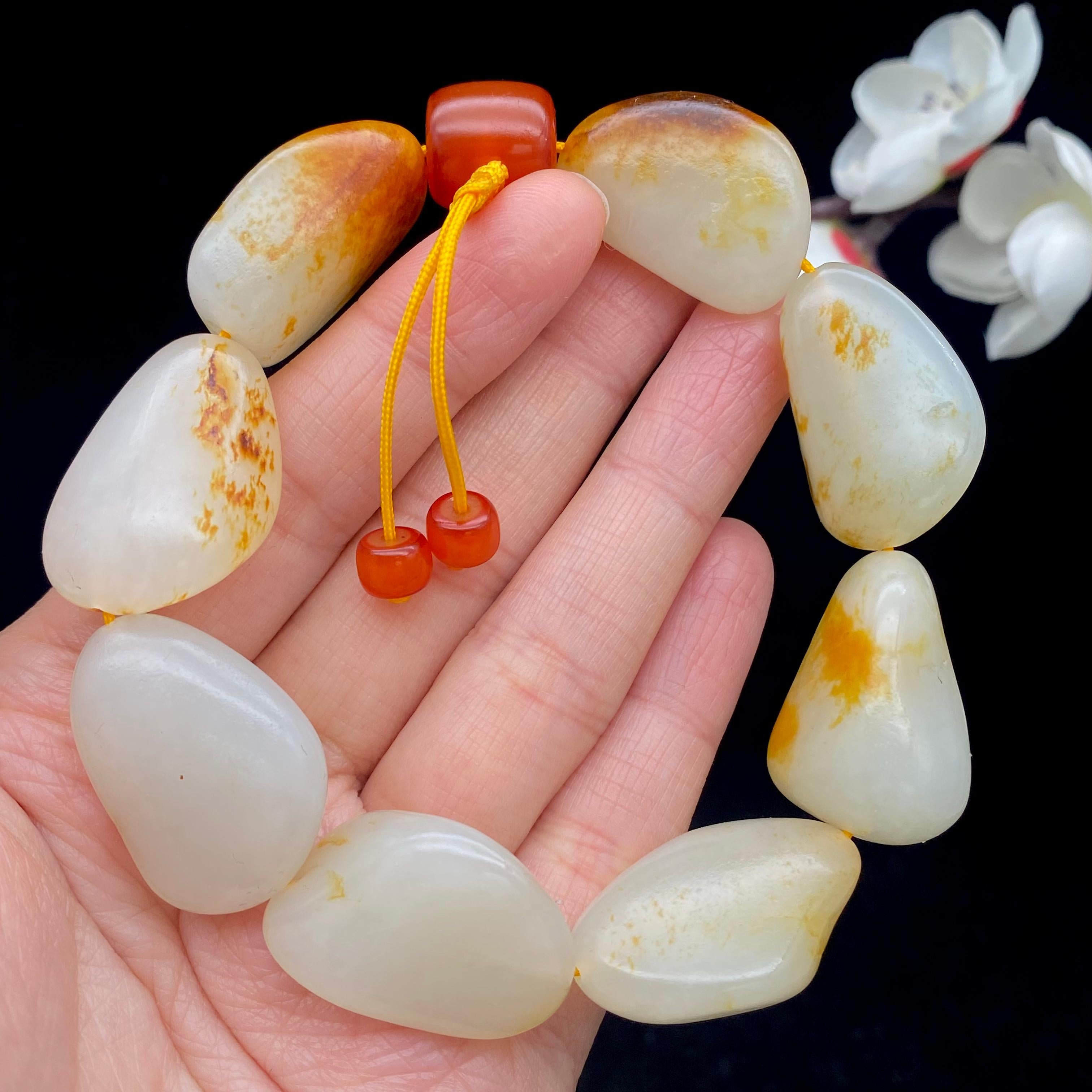 和田玉洒红皮籽料【精品手串】（75.9g）