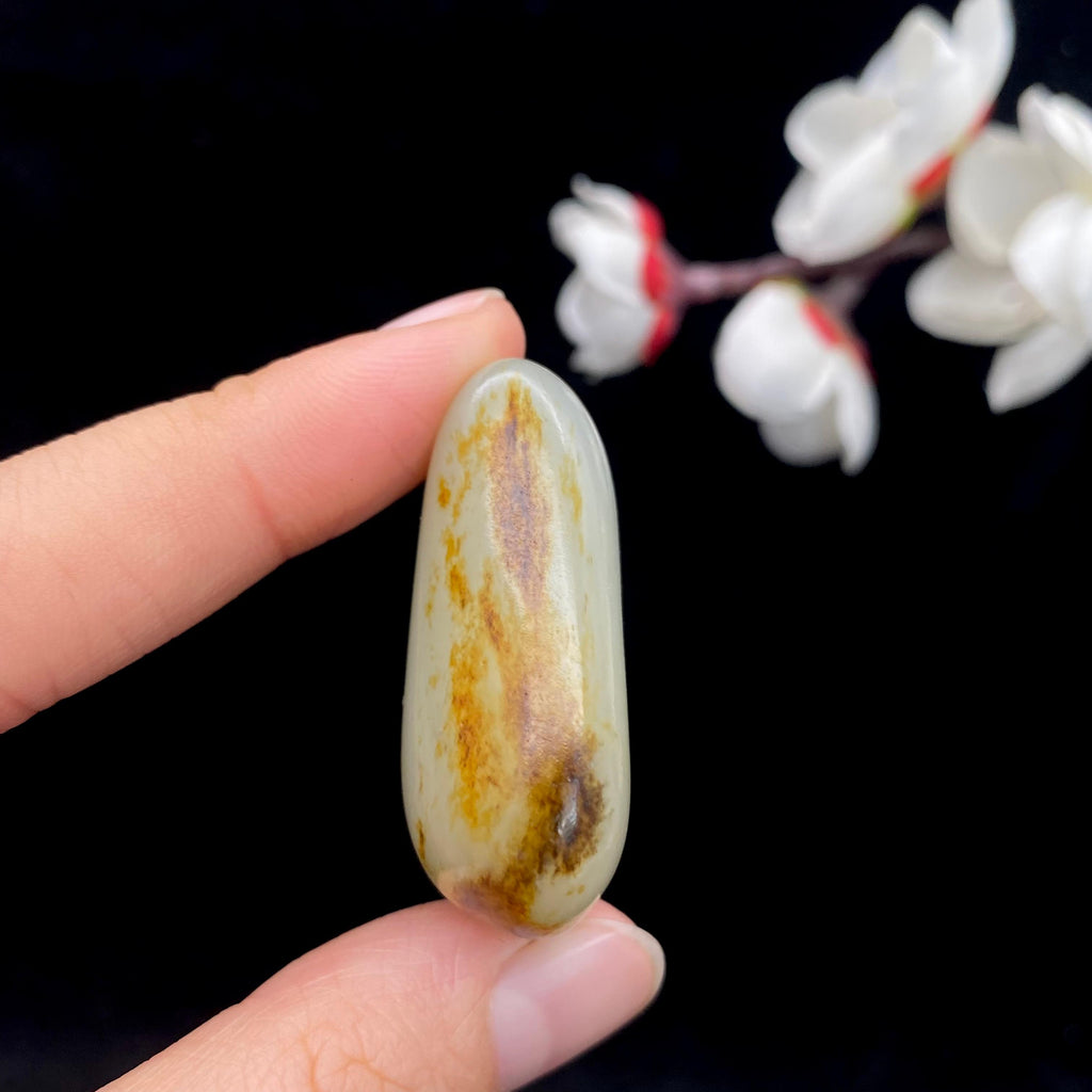 和田玉聚黄皮籽料挂件（28.4g）
