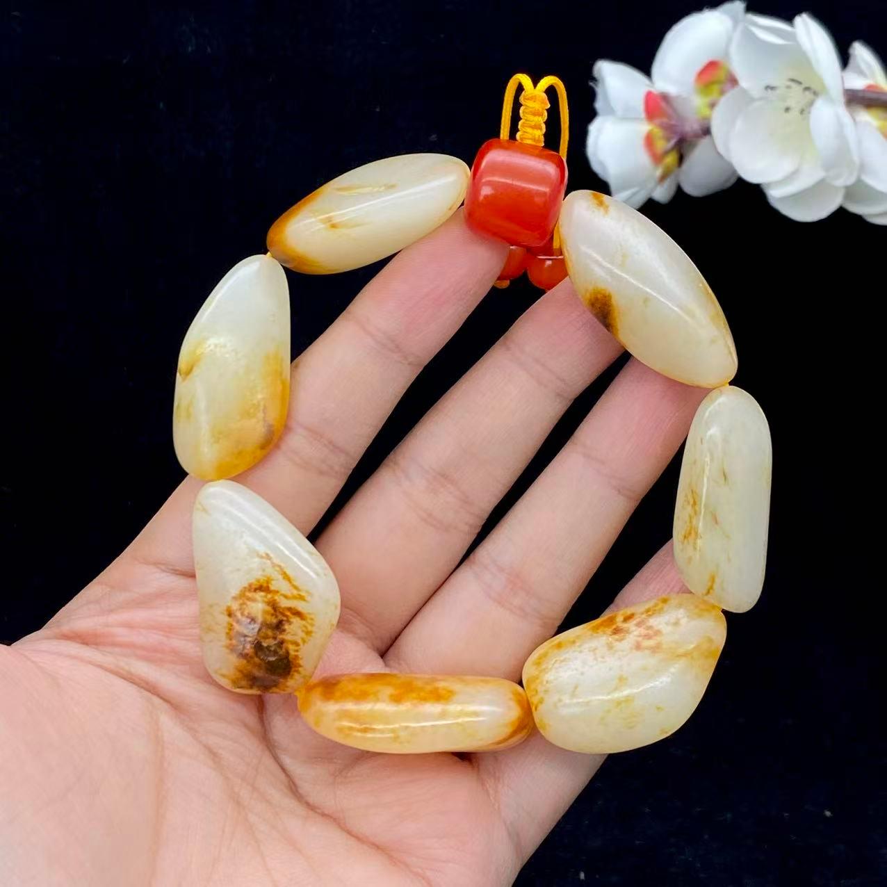 和田玉洒红皮籽料【精品手串】（90.8g）