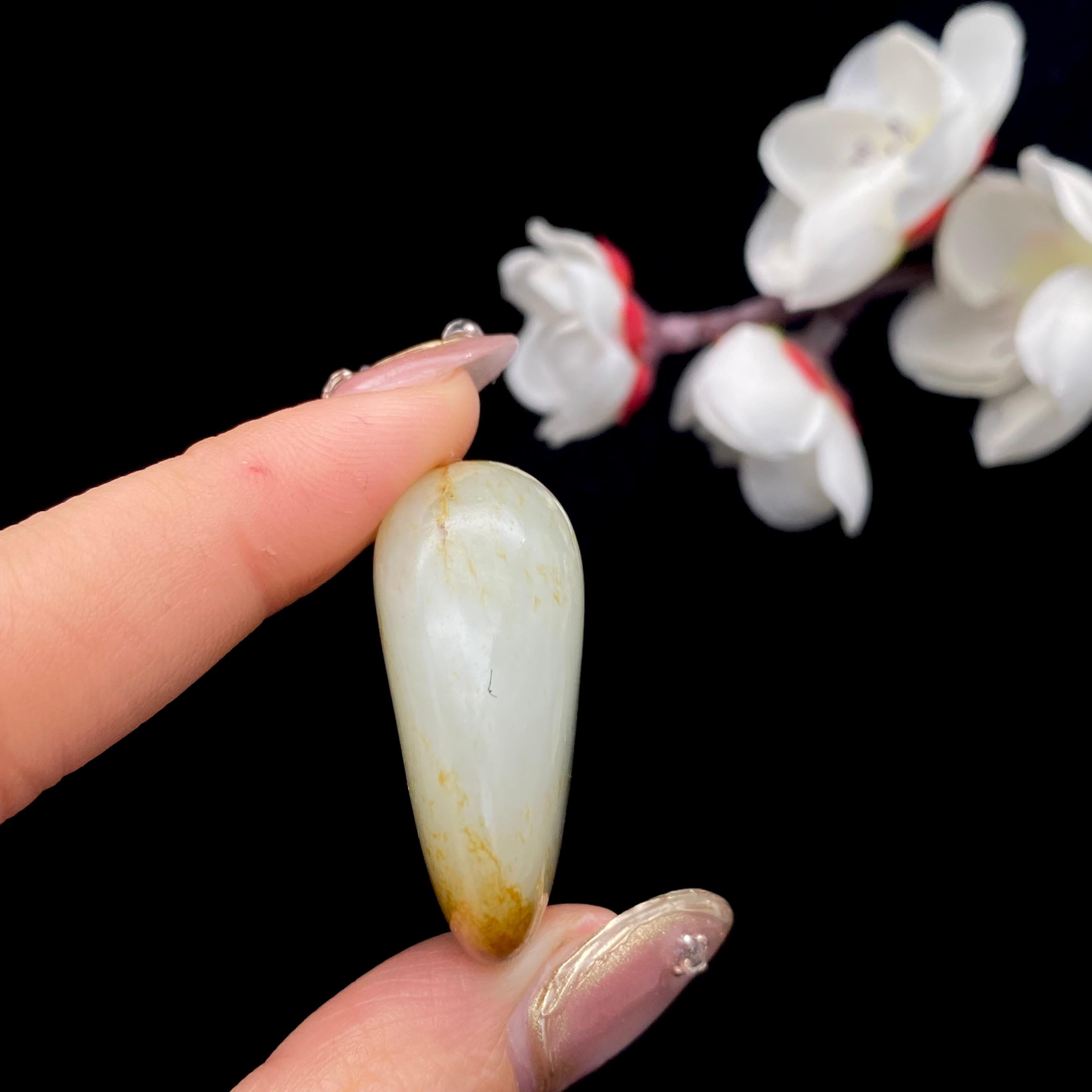 和田玉聚黄皮籽料挂件（24.3g）