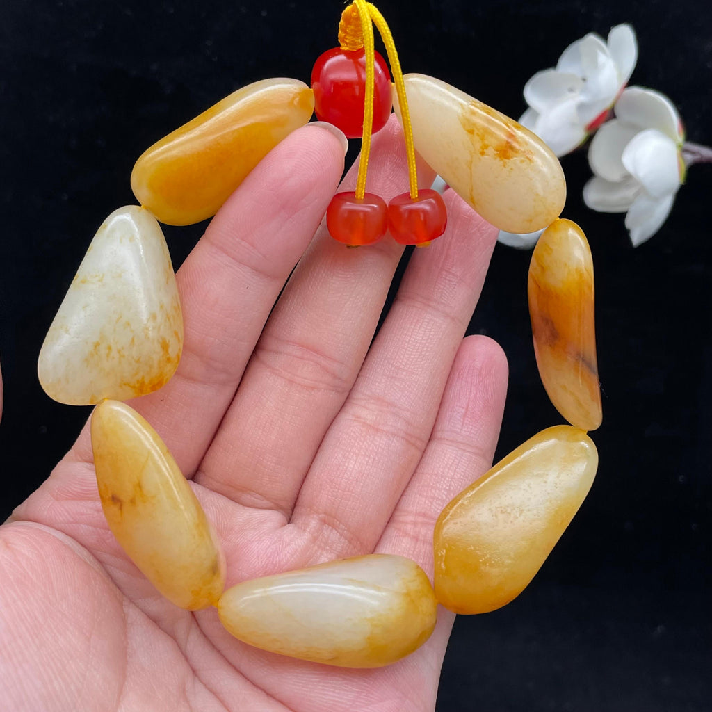 和田玉聚黄皮籽料【精品手串】（78.7g）