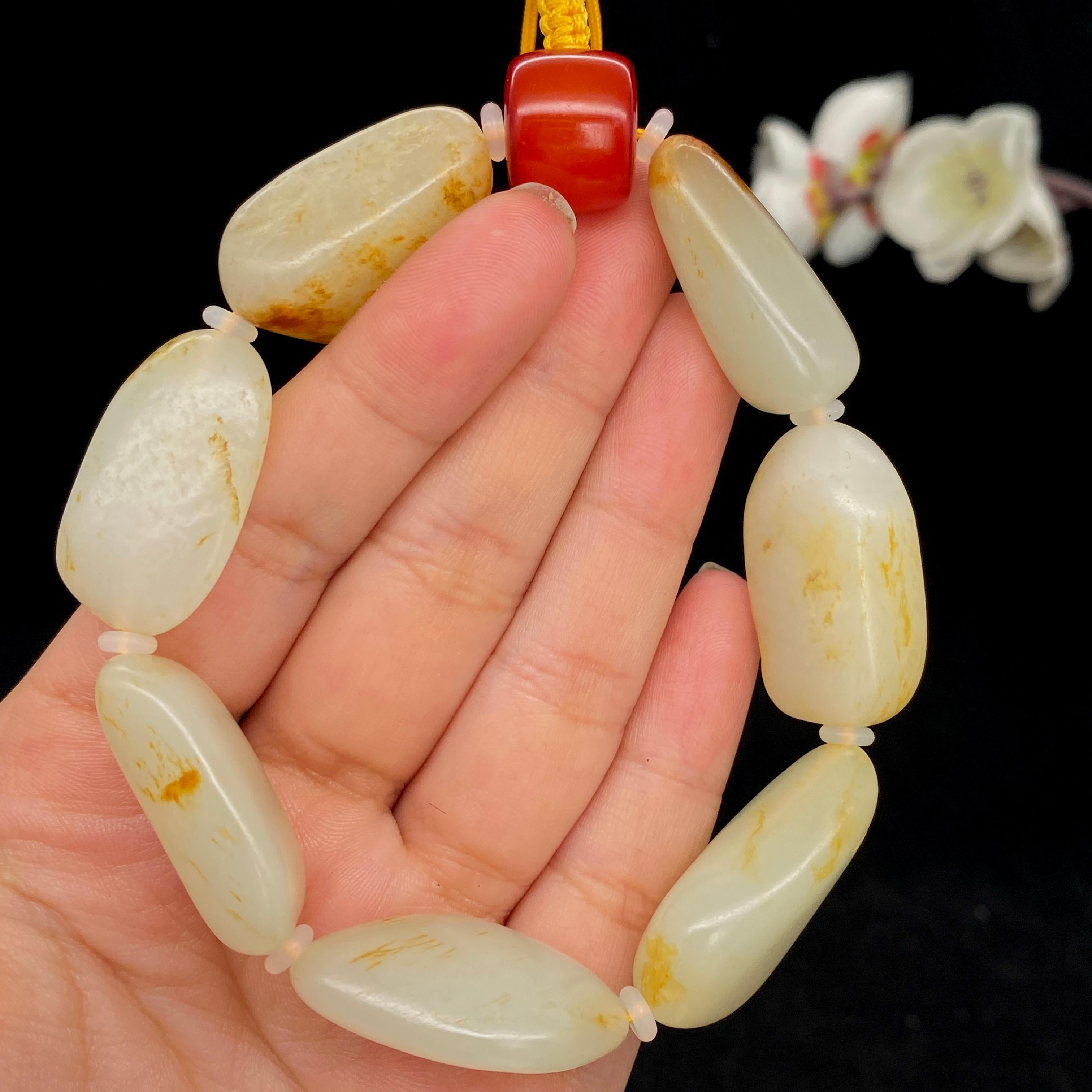 和田玉洒红皮籽料【精品手串】（68g）