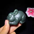 和田玉沙枣青手把件兔子（160.0g）