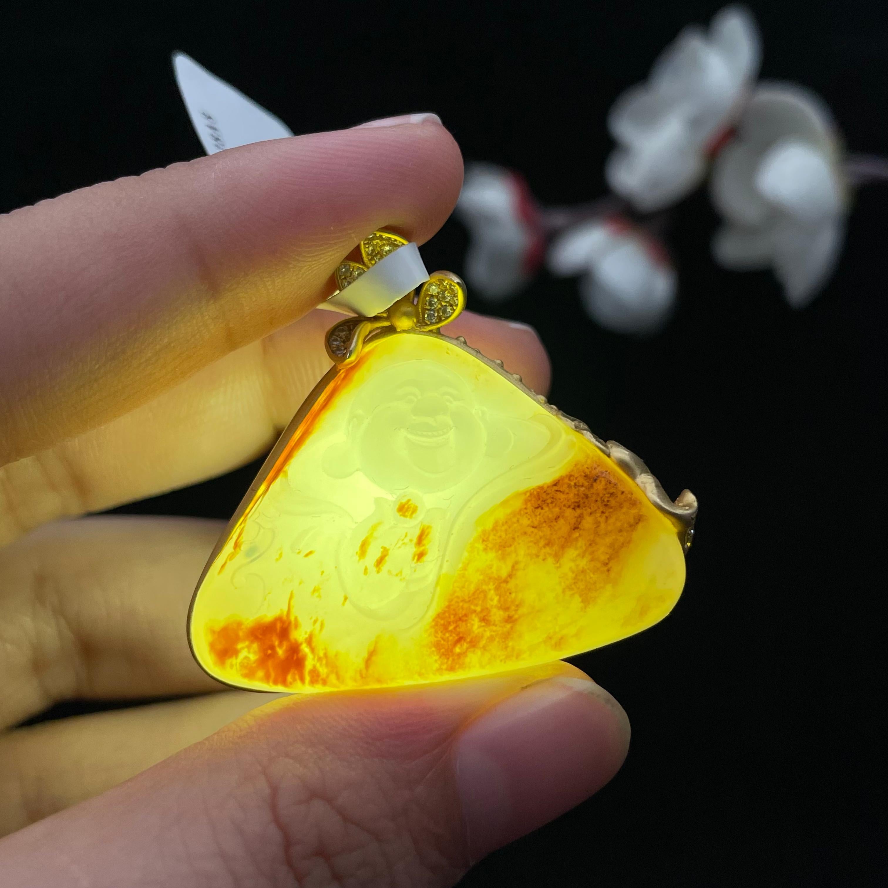 和田玉-红皮籽料包金【佛公】（25.0g）