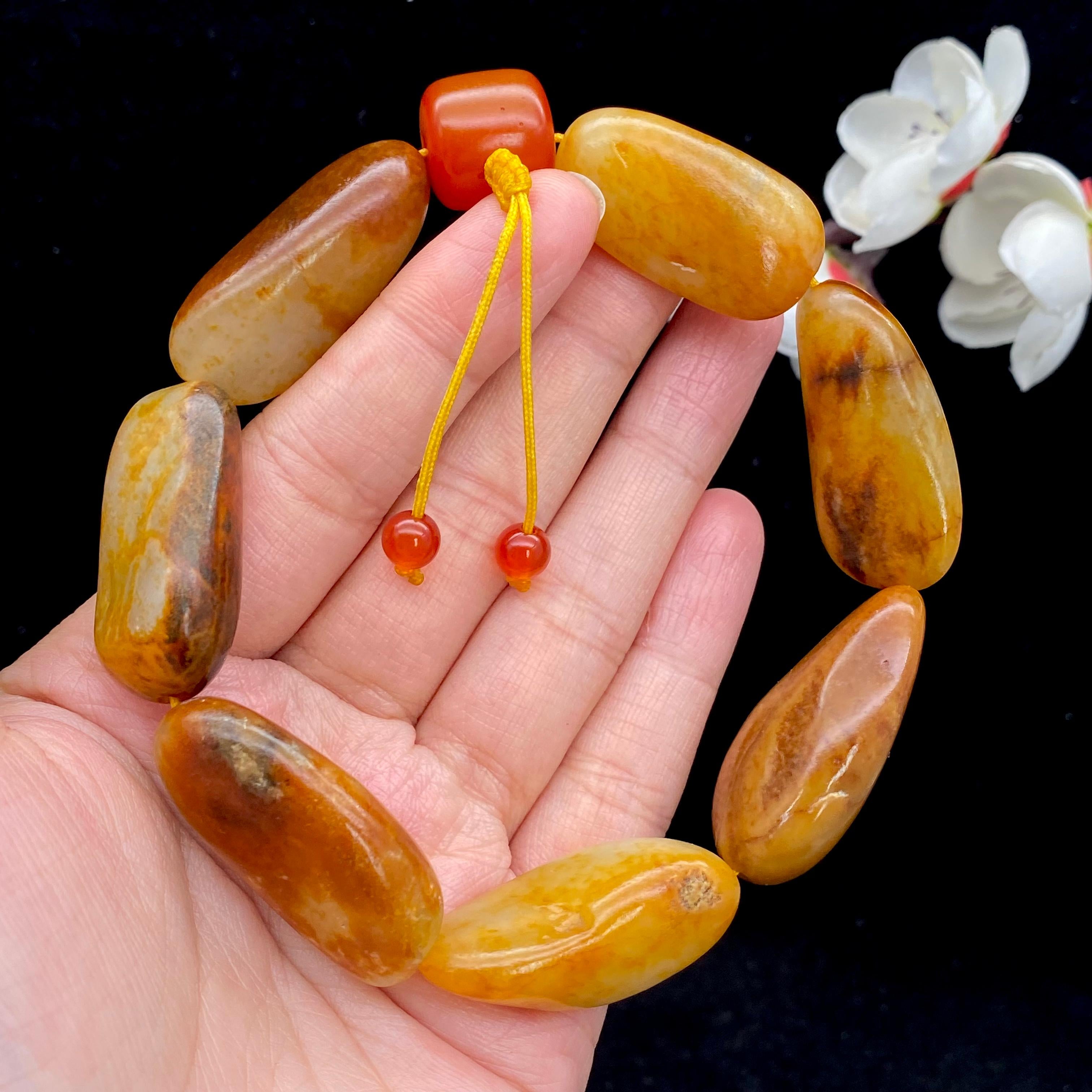 和田玉聚红皮籽料【精品手串】（83.1g）