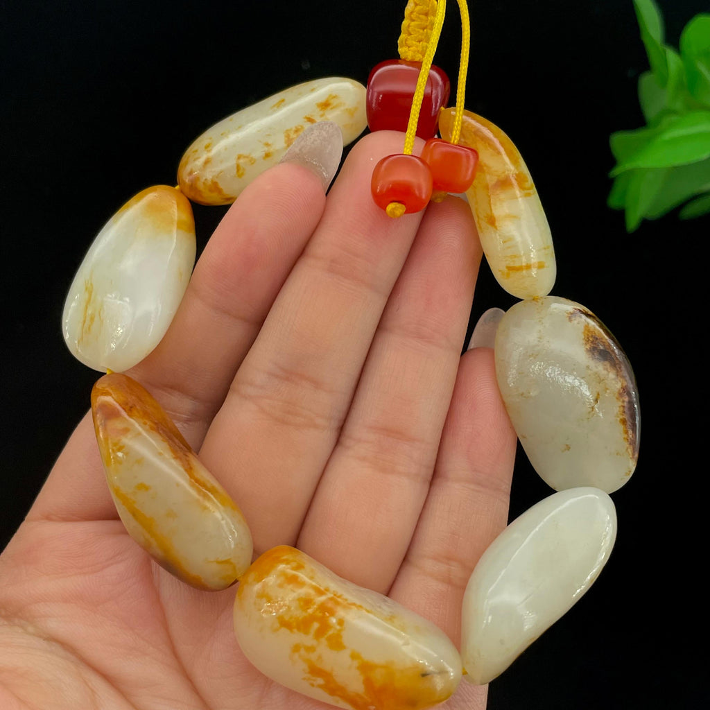 和田玉聚黄皮籽料【精品手串】（77.2g）