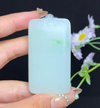 和田玉羊脂白玉带翠平安无事牌（60.6g）