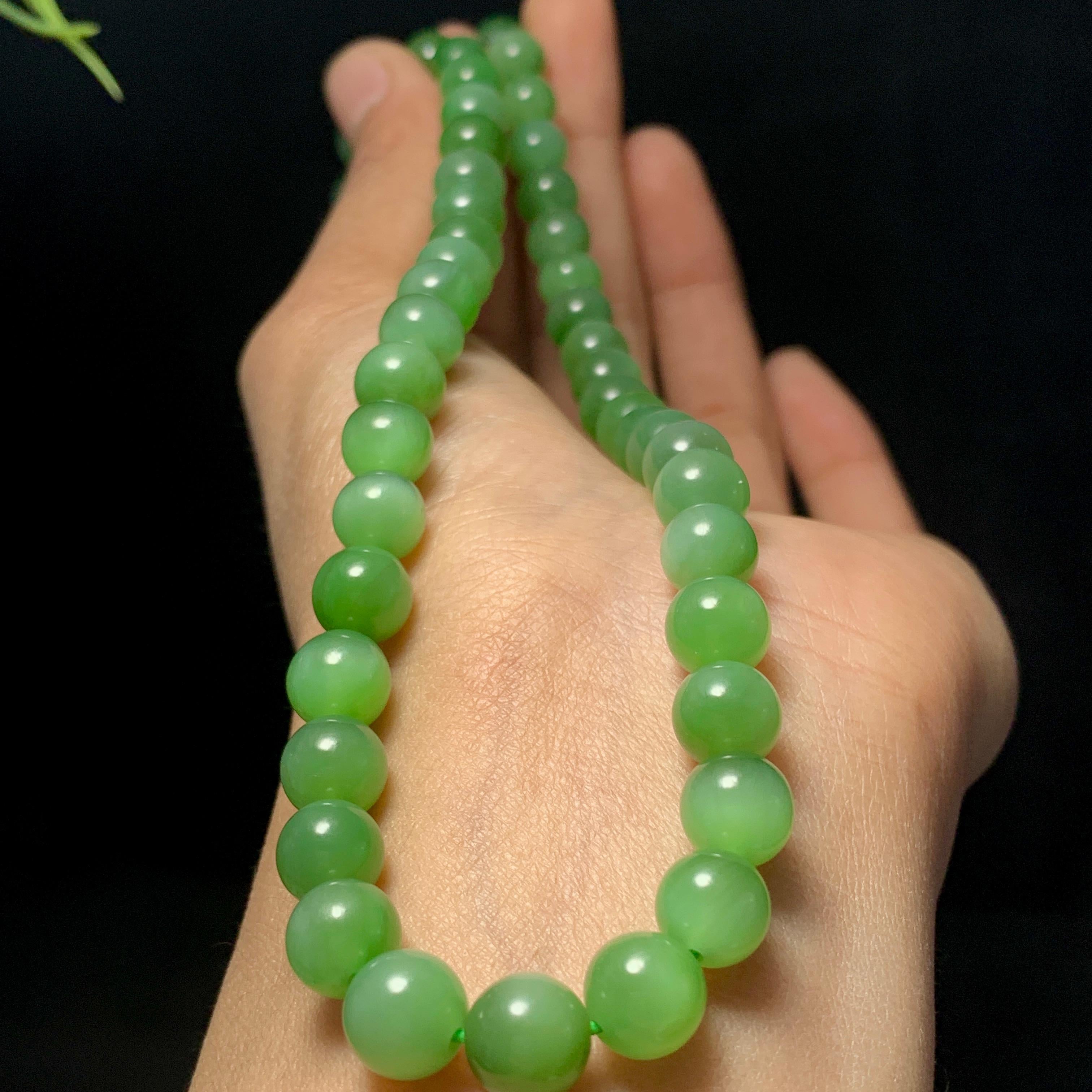 高品质和田碧玉粉绿猫眼项链（43.7g）