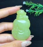 和田玉若羌黄口料财神（44.3g）