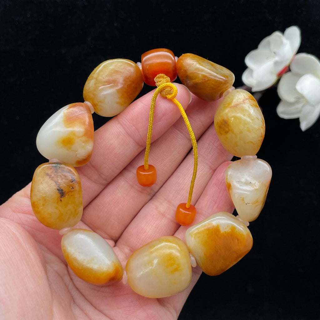 和田玉聚黄皮籽料【精品手串】（68.1g）