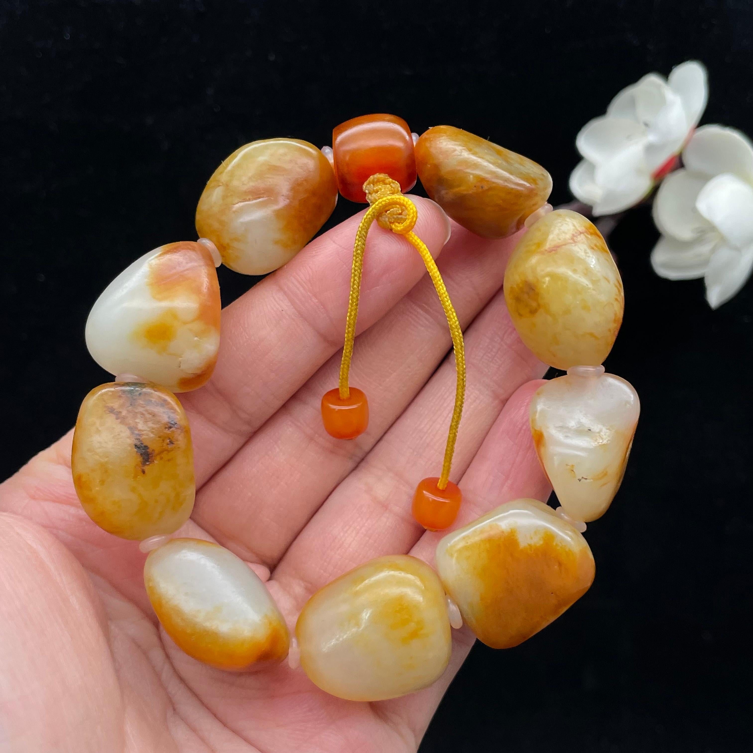 和田玉聚黄皮籽料【精品手串】（68.1g）