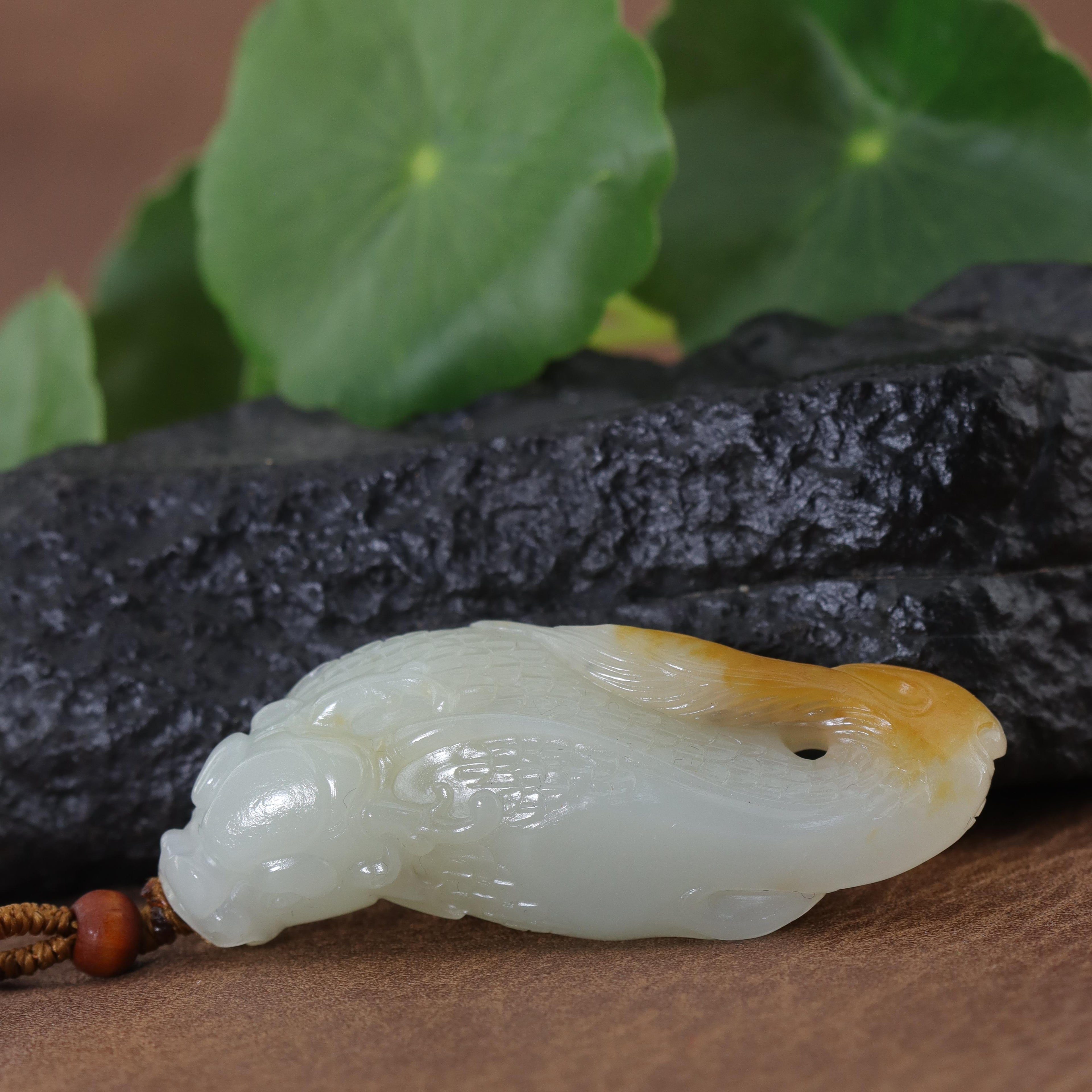 和田玉籽料黄皮巧雕鱼化龙挂坠（34.8g）