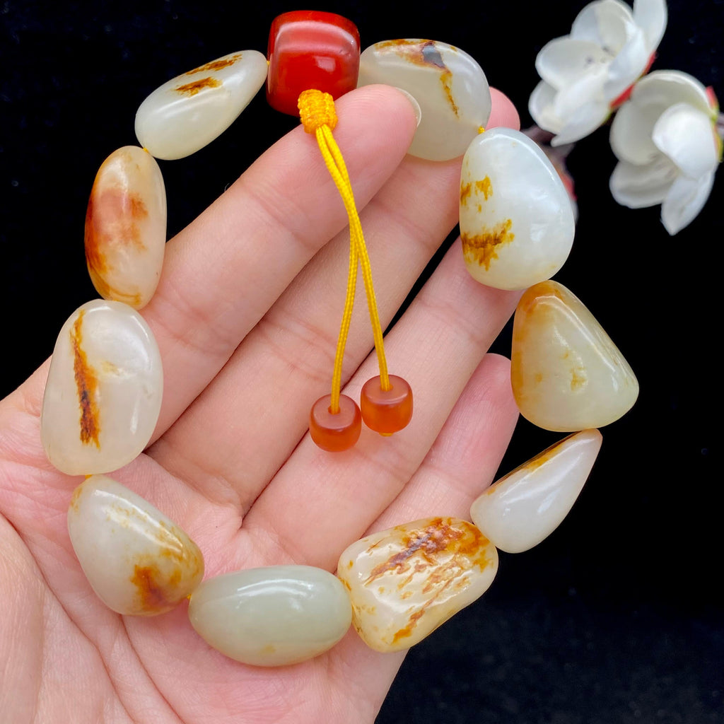 和田玉洒红皮籽料【精品手串】（60.9g）