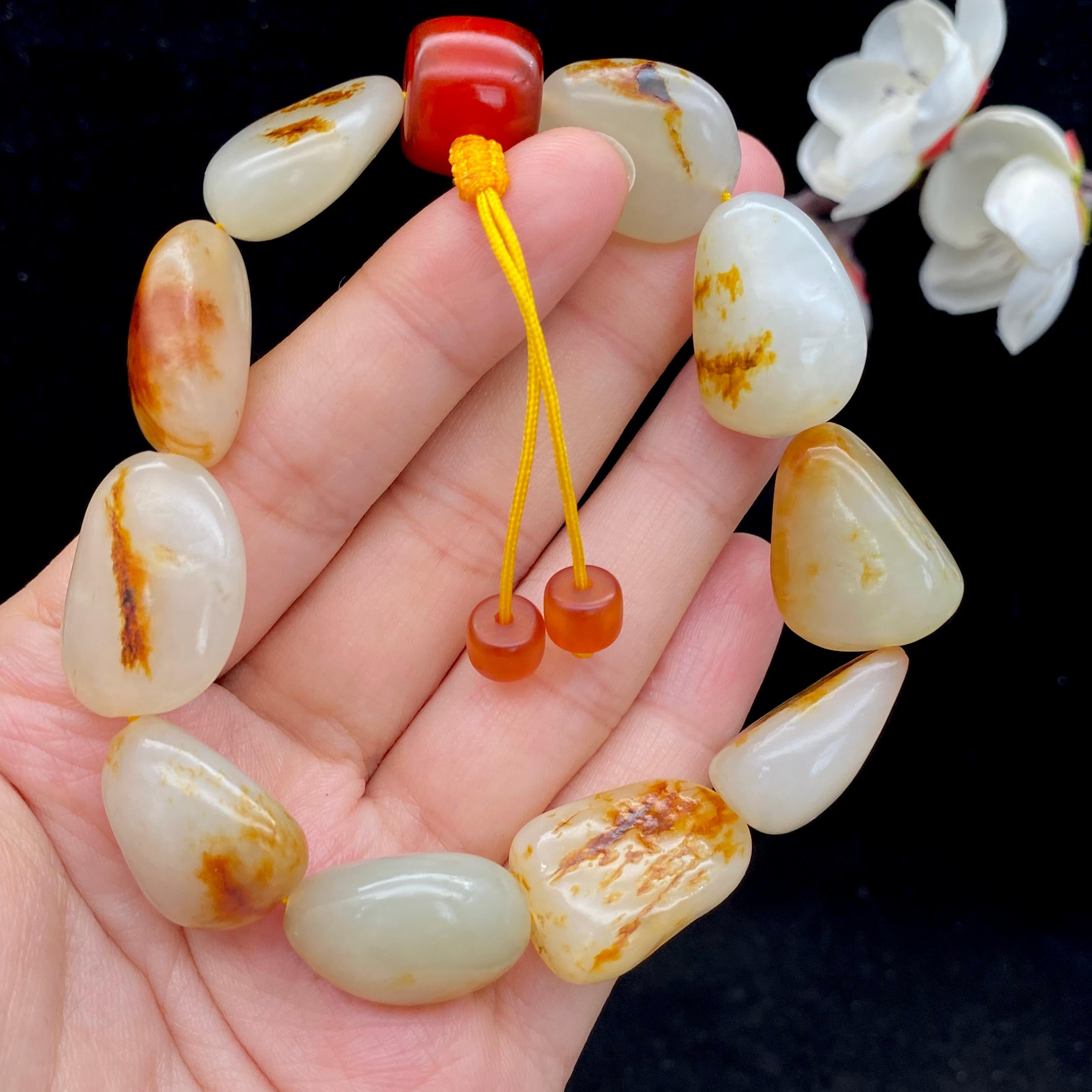 和田玉洒红皮籽料【精品手串】（60.9g）