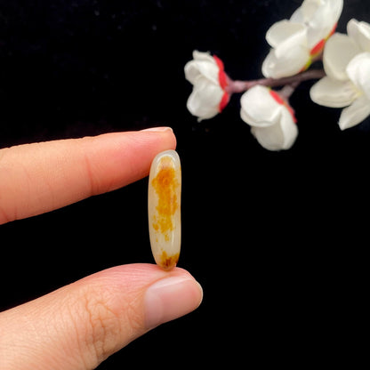 和田玉聚红皮籽料原石（4.8g）
