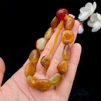 和田玉聚黄皮籽料【精品手串】（33.9g）