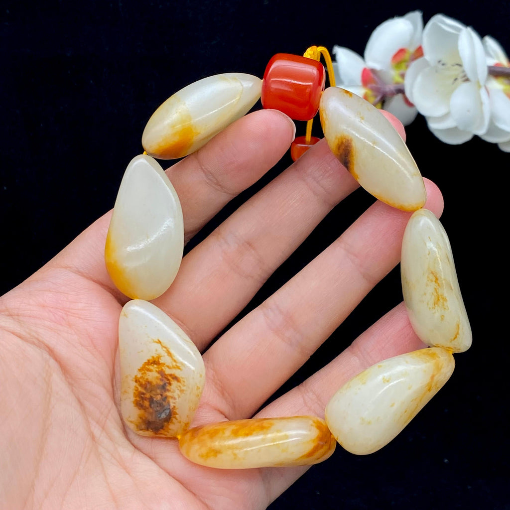 和田玉洒红皮籽料【精品手串】（90.8g）