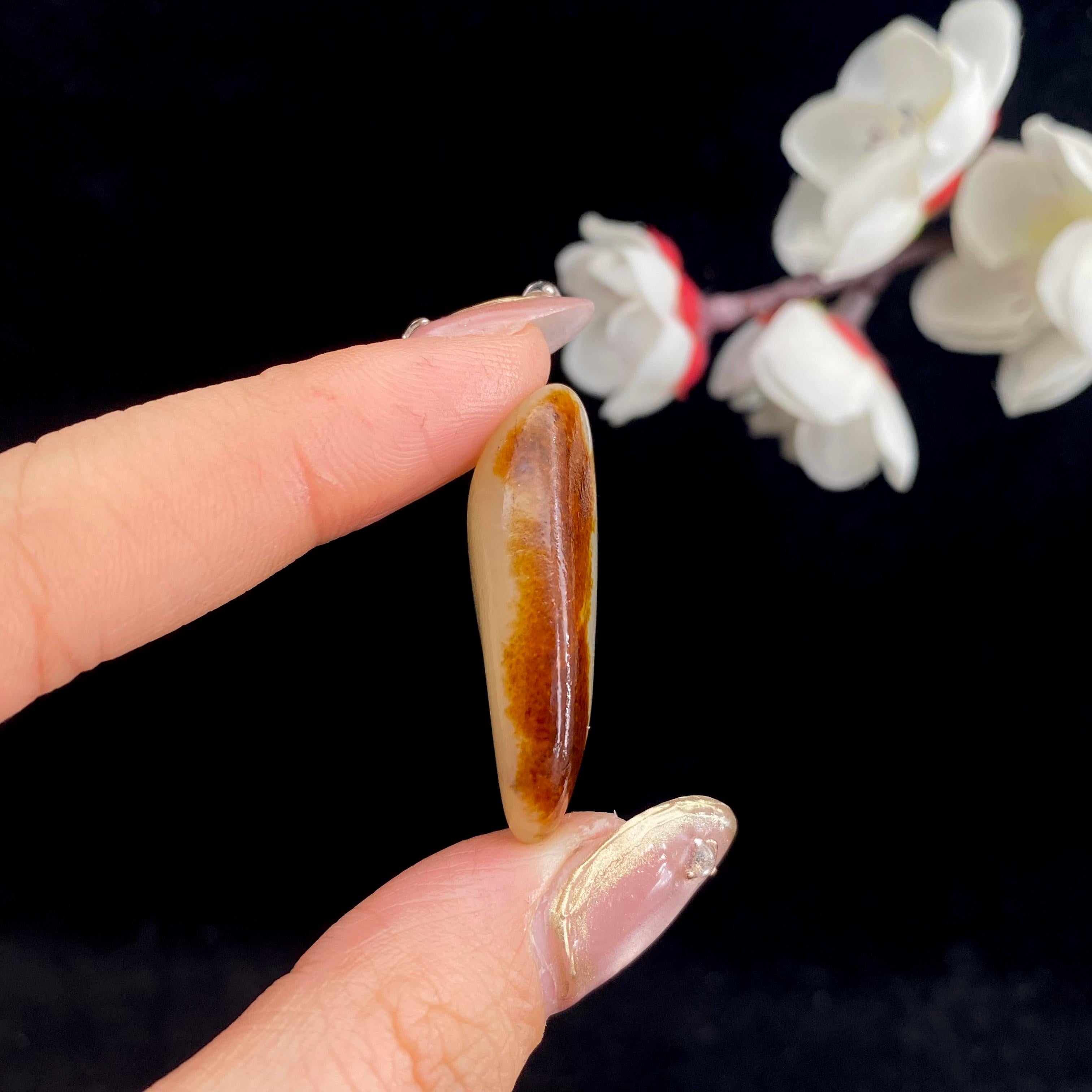 和田玉聚红皮籽料原石（9.1g）