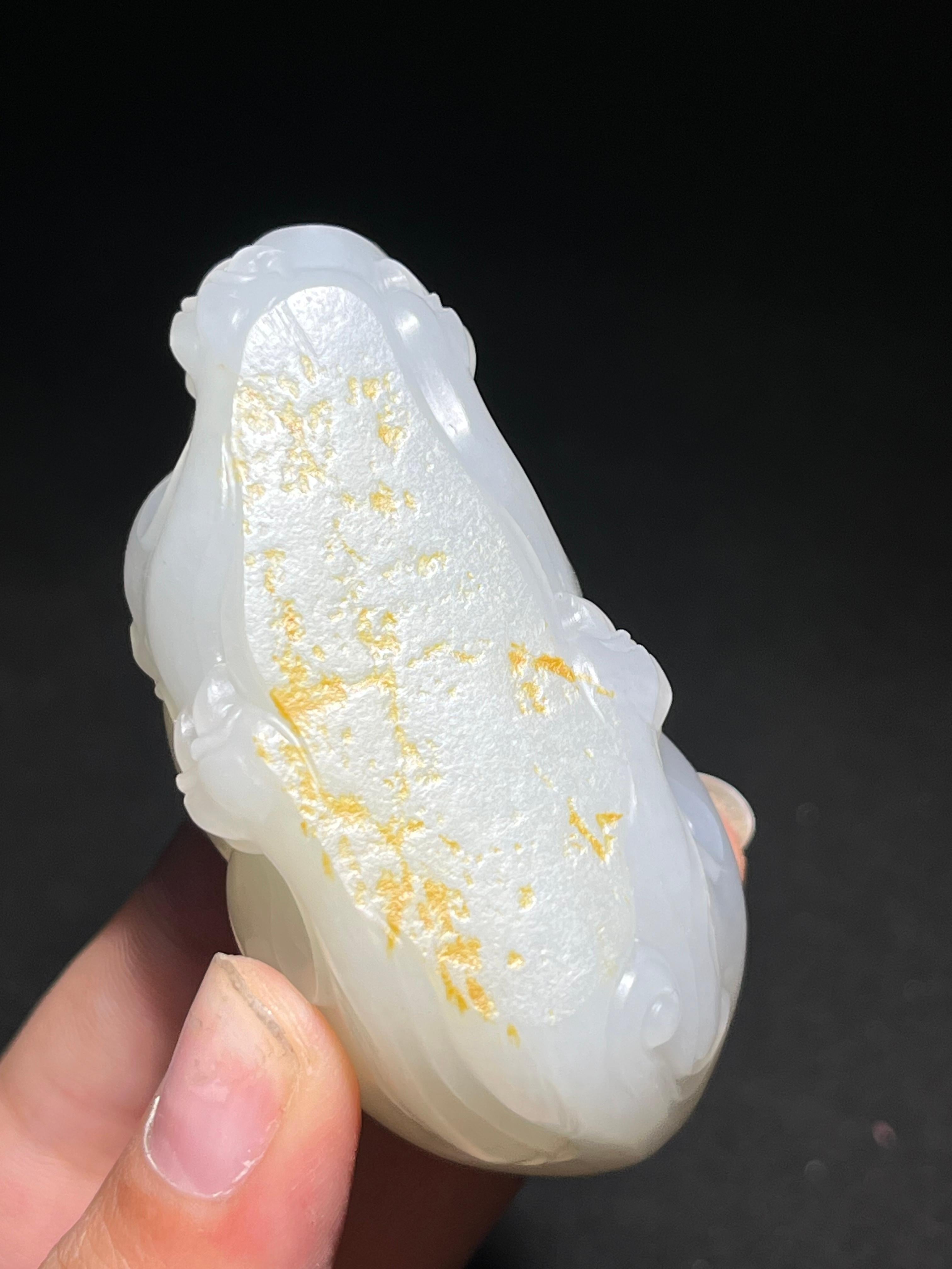和田玉籽料白玉貔貅。（137.0g）