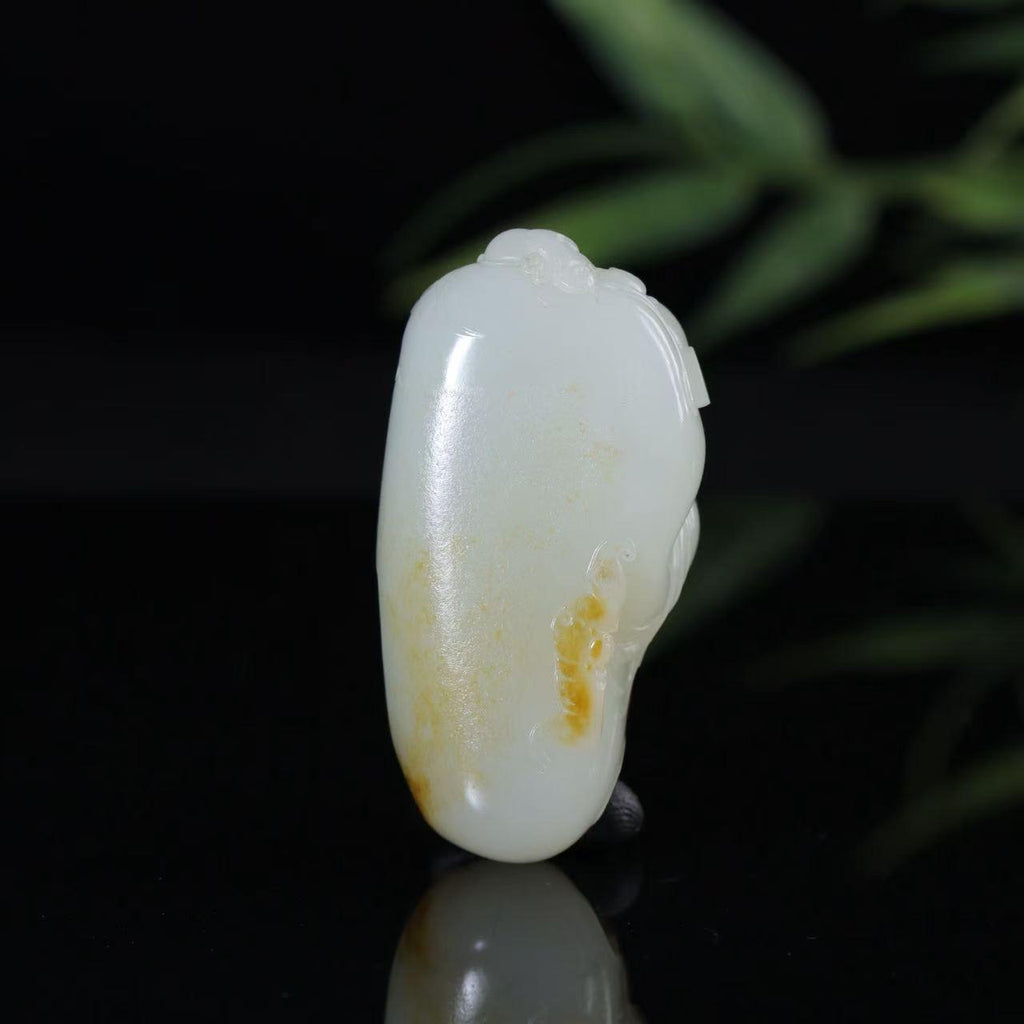 和田玉白玉红皮财神挂坠（65.4g）