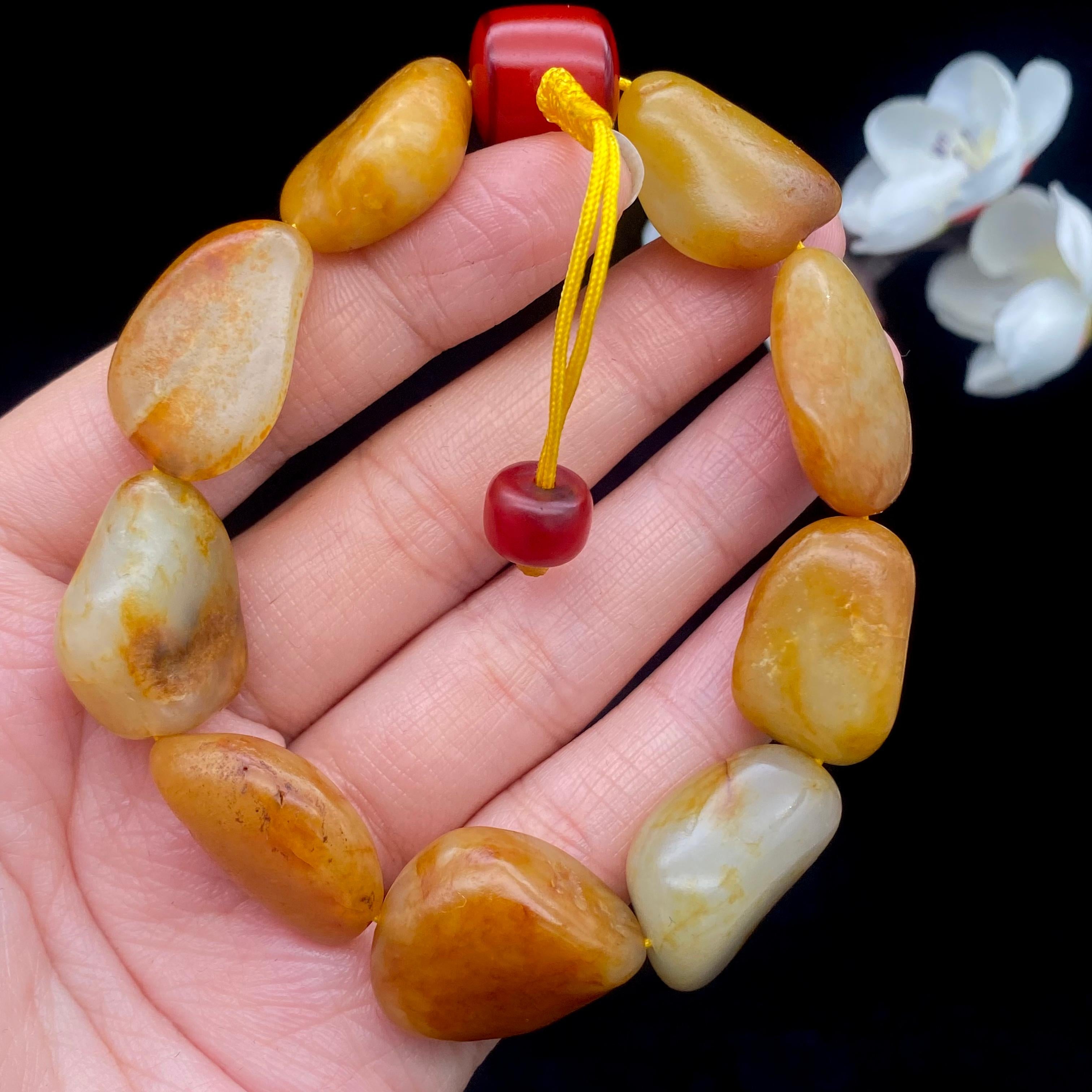 和田玉聚黄皮籽料【精品手串】（49.4g）