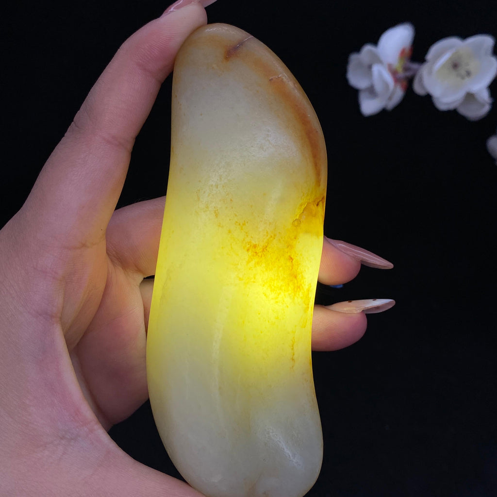 和田玉聚黄皮籽料手把件（180.8g）