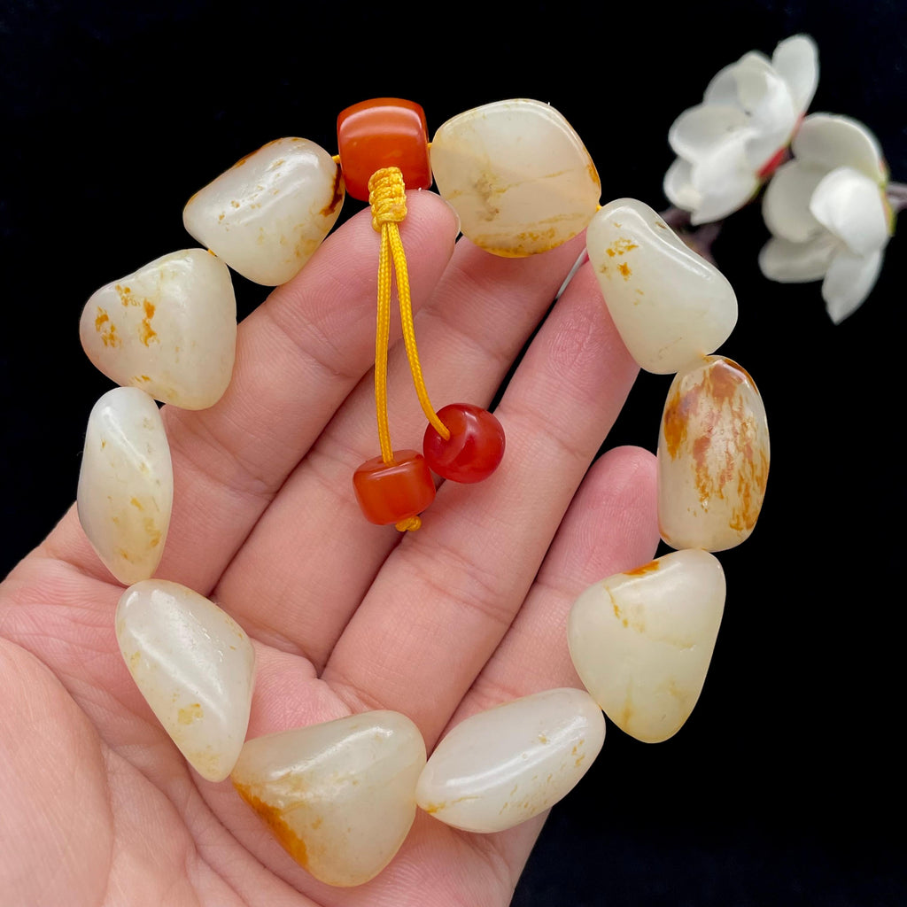 和田玉洒红皮籽料【精品手串】（64g）