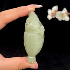 秒杀和田玉青白玉带糖【龙守元宝】手把件（77.8g）