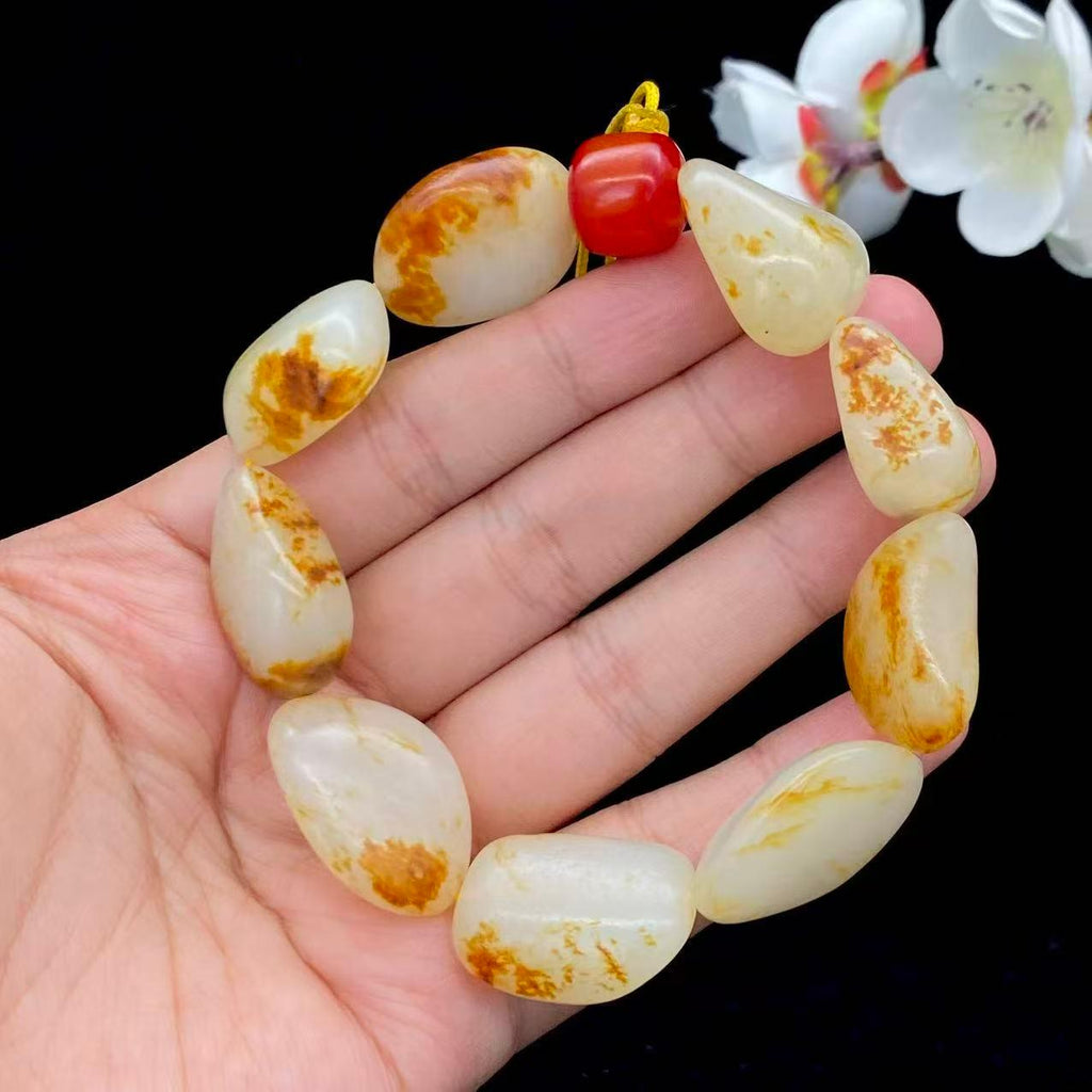 和田玉洒红皮籽料【精品手串】（73.9g）