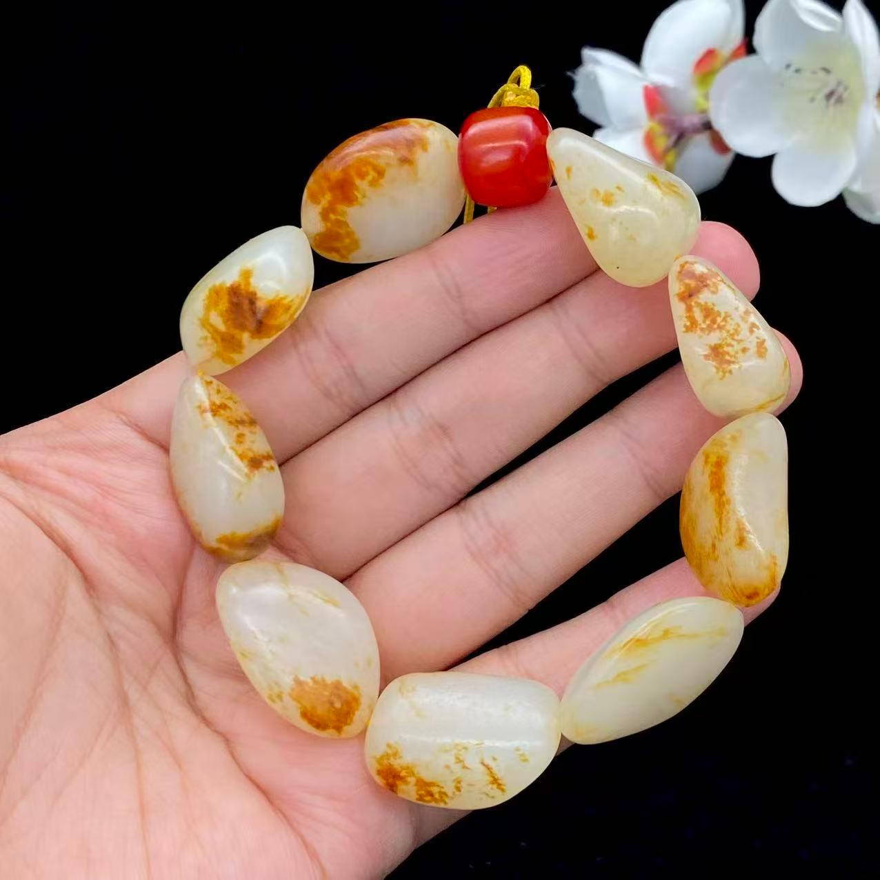和田玉洒红皮籽料【精品手串】（73.9g）