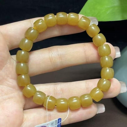 新疆和田玉且末黄金糖直切老型珠手串（30.3g）