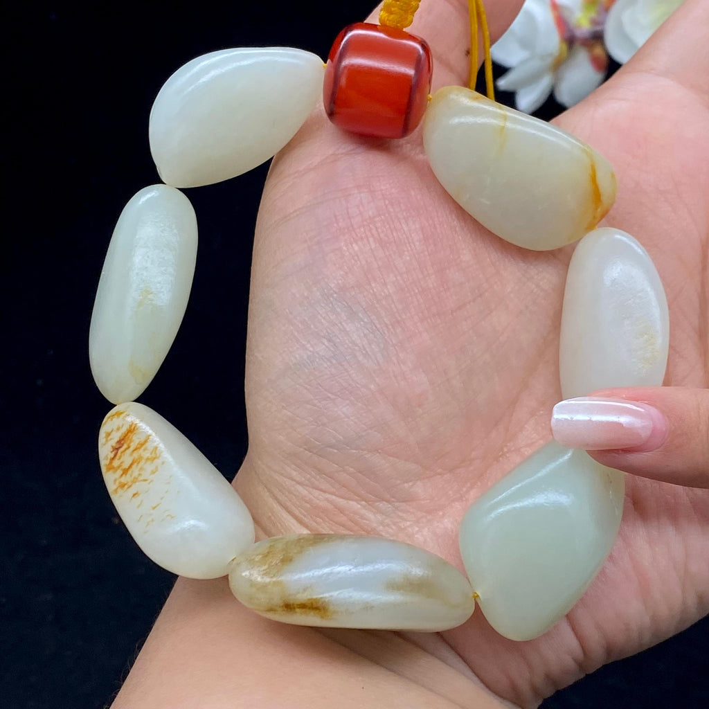 和田玉洒金皮籽料【精品手串】（109.6g）