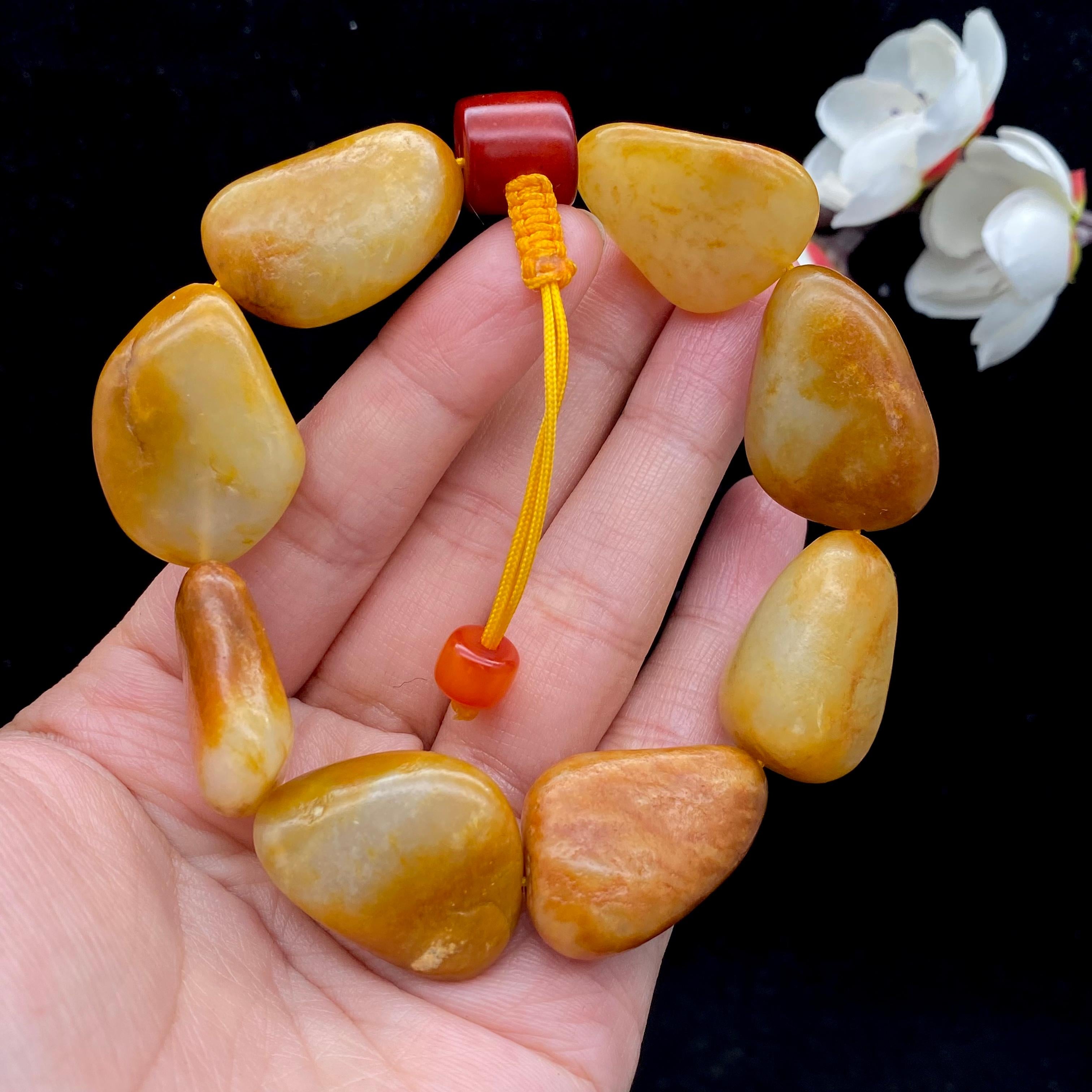 和田玉聚黄皮籽料【精品手串】（71.4g）