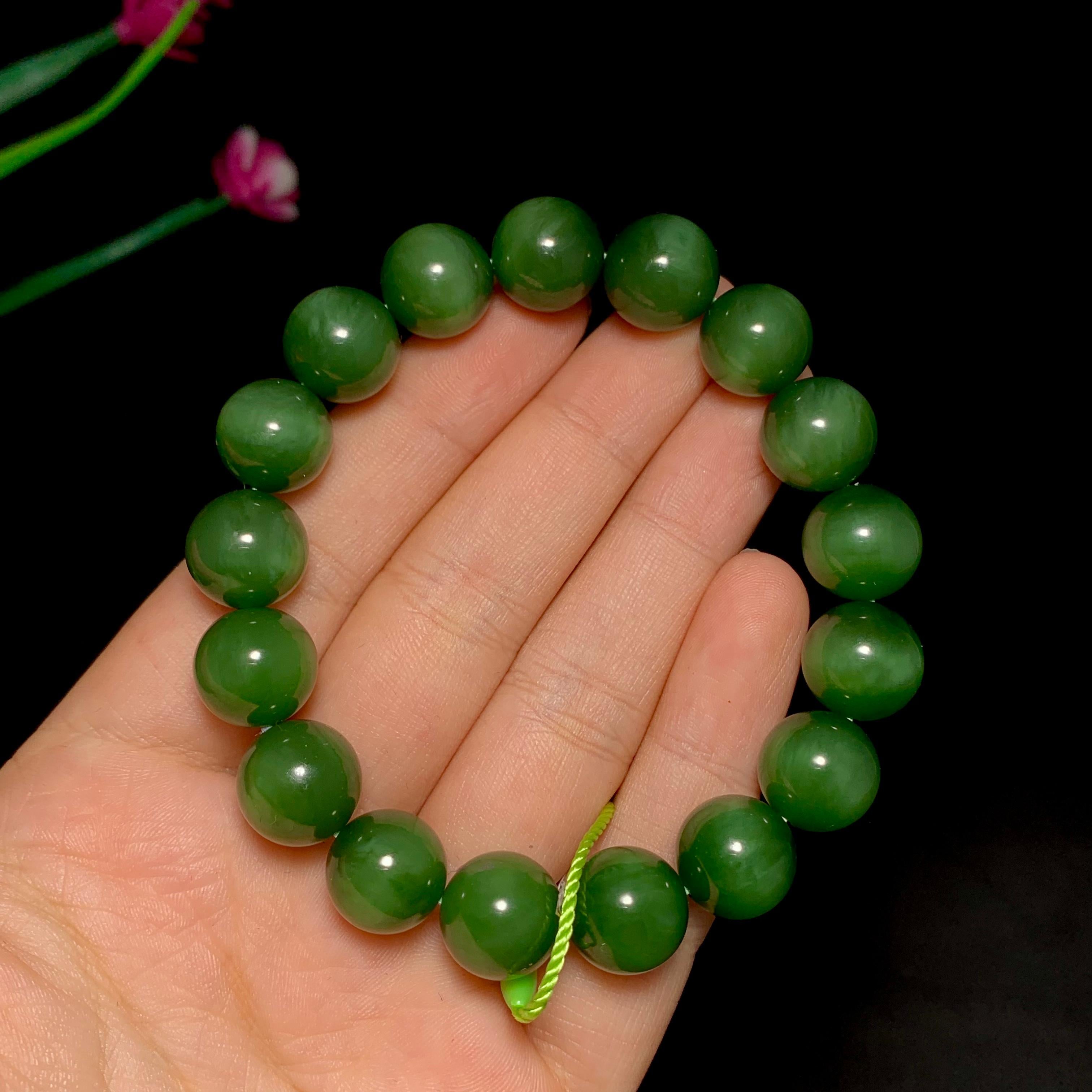 高品质碧玉菠菜绿猫眼圆珠手串（47.9g）