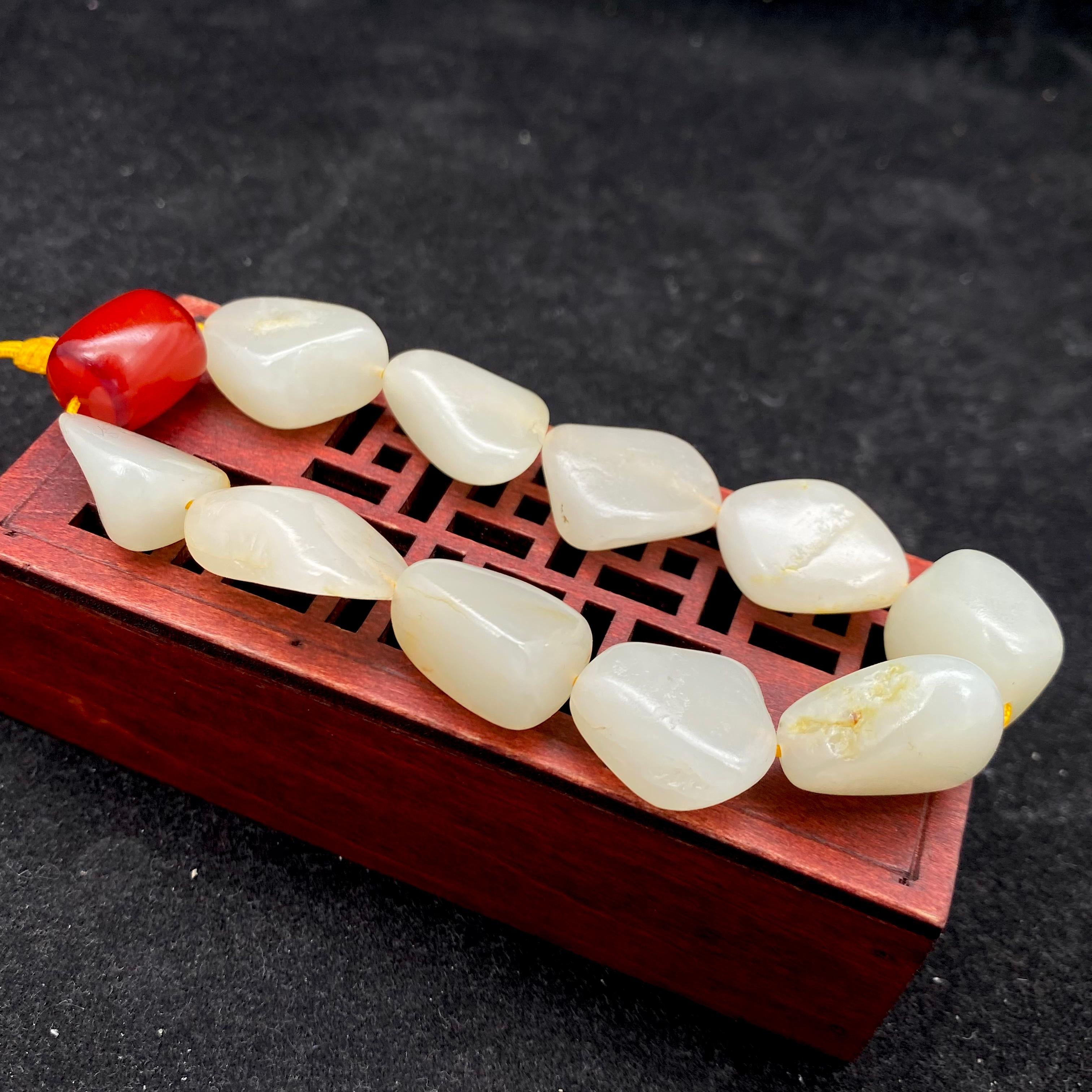 和田玉白玉带黄皮【精品手串】（69g） – 厚德载玉