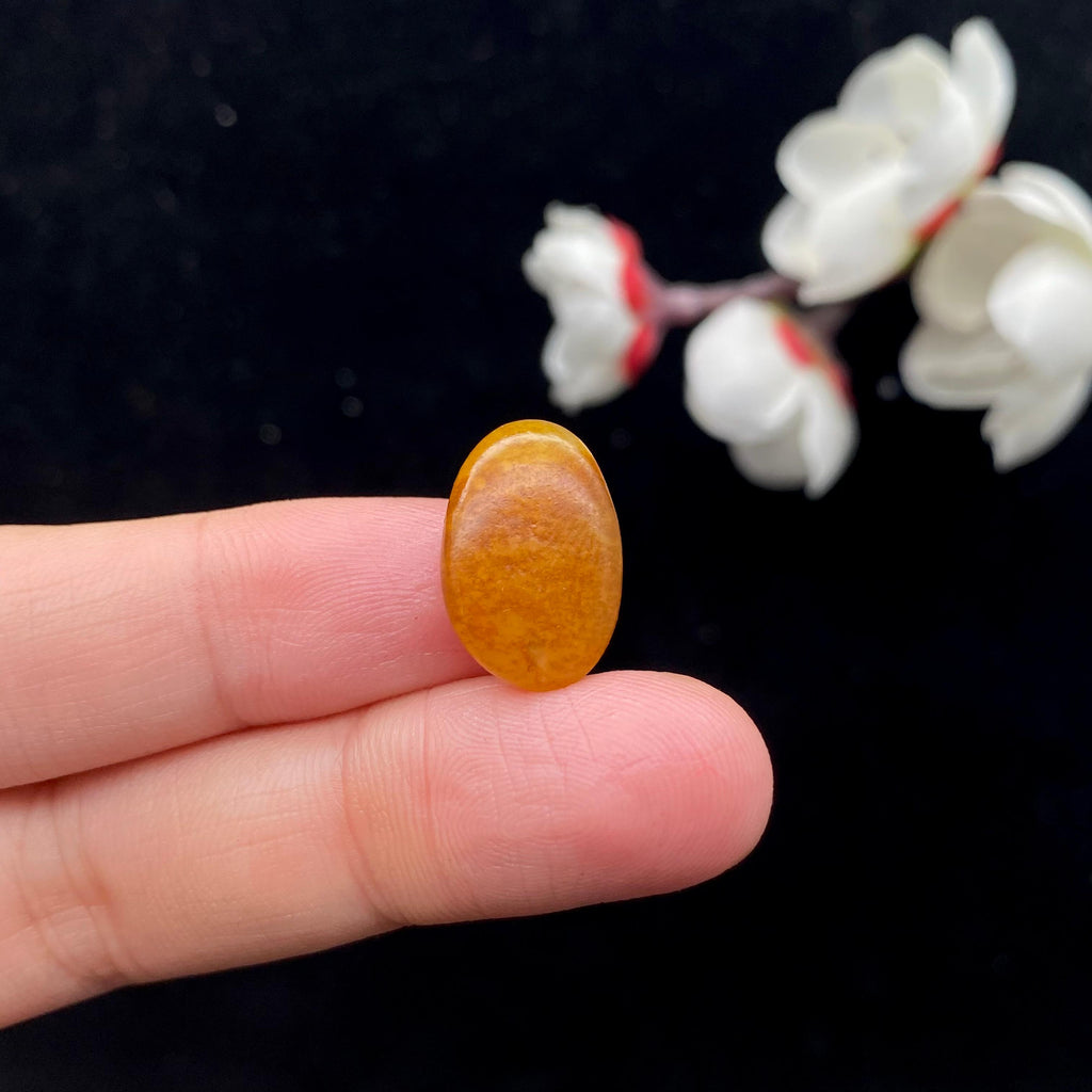 和田玉满黄皮籽料戒面籽（2.1g）