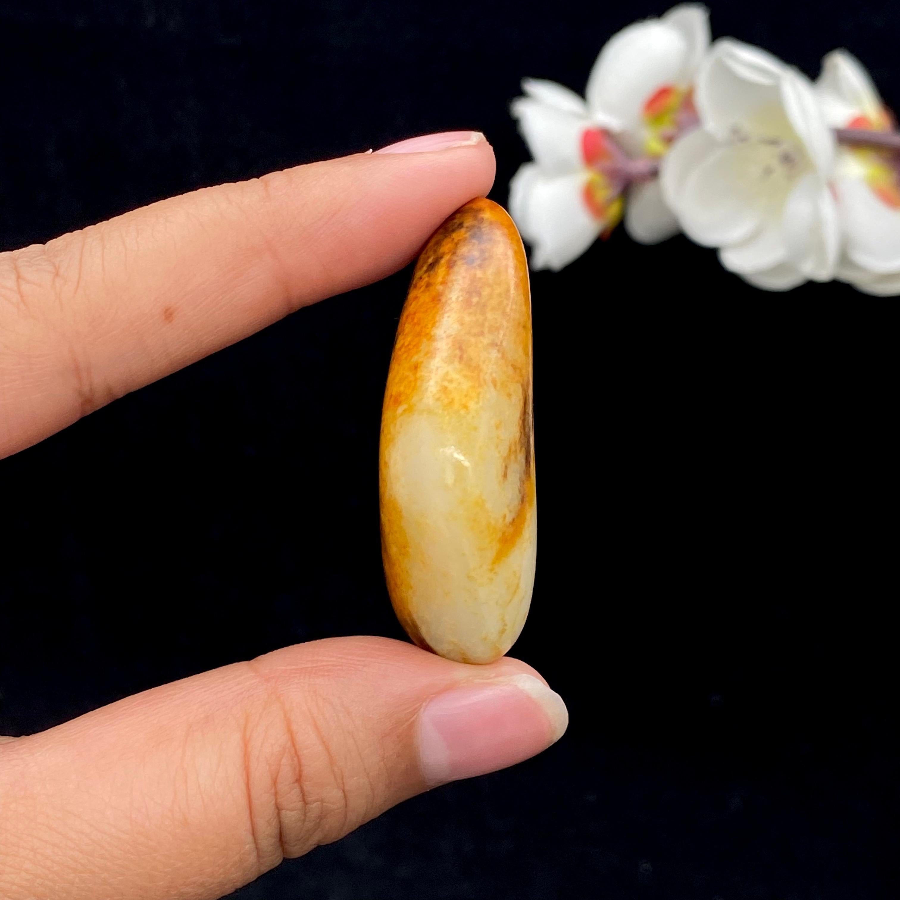 和田玉聚黄皮籽料挂件（25.6g）