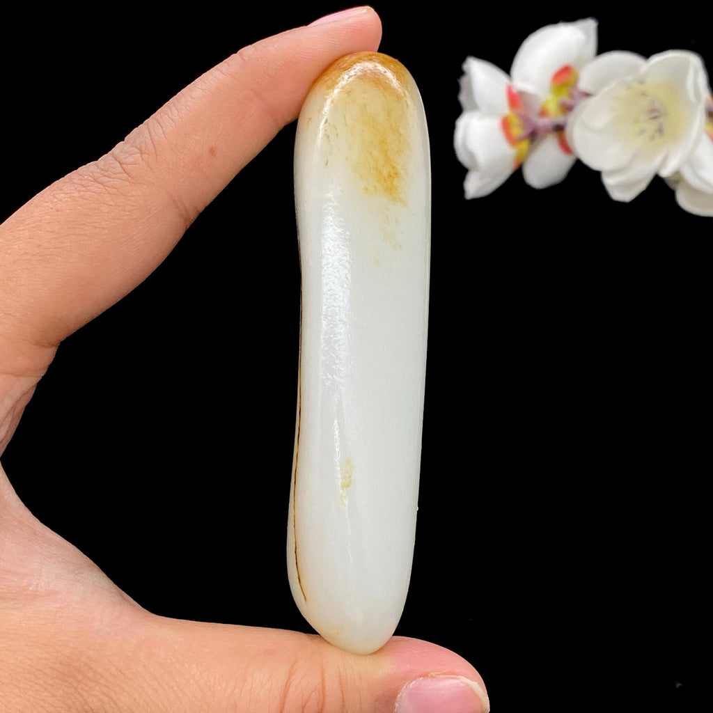 和田玉聚黄皮籽料手把件（126.6g）