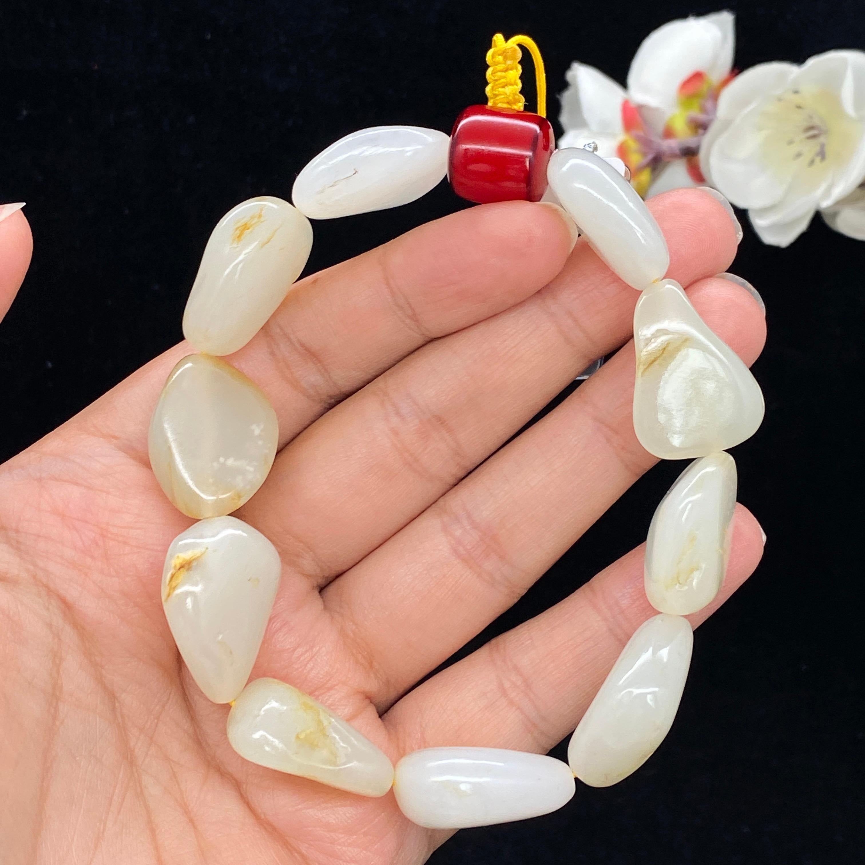秒杀和田玉-白玉带黄皮籽料【精品手串】H2603300281（56.7g）