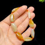 和田玉黄皮籽料手串（21.53g）