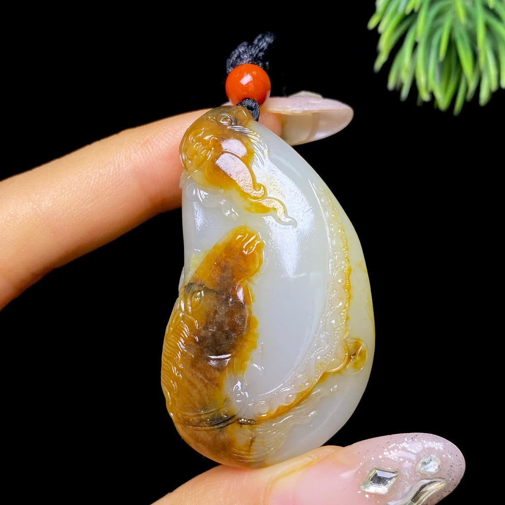 和田玉籽料财神遇马（34.4g）