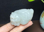 和田玉藕粉带烟紫龙龟手把件（127.3g）